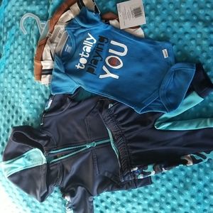 Blue track suit outfit.  joggers, hoodie with 3 onesie, football. 0-3 mo